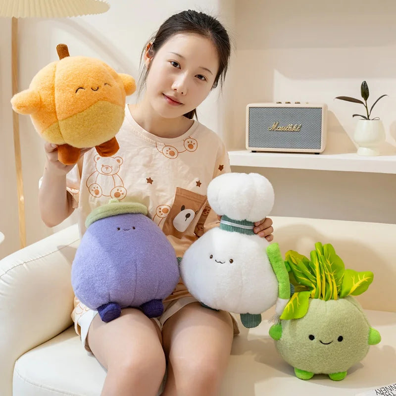 Person sitting on a couch holding four cute kawaii plush toys shaped like vegetables.