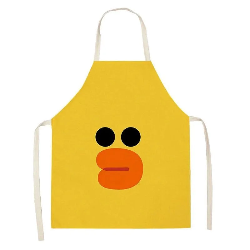 Yellow kawaii apron with a cartoon face design on a white background