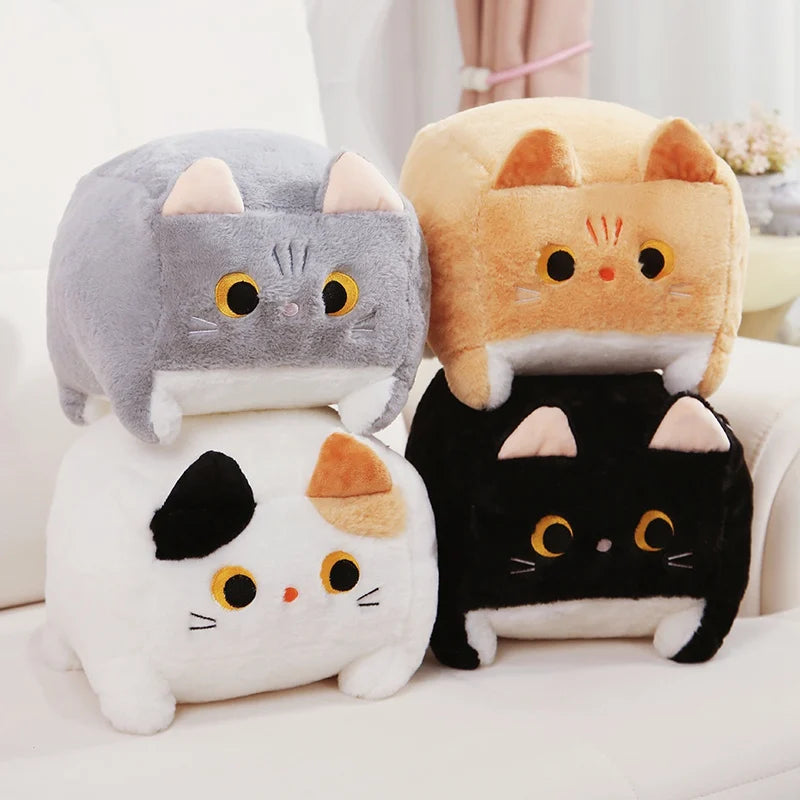 Four cat-shaped kawaii plush toys in different colors on a white surface.