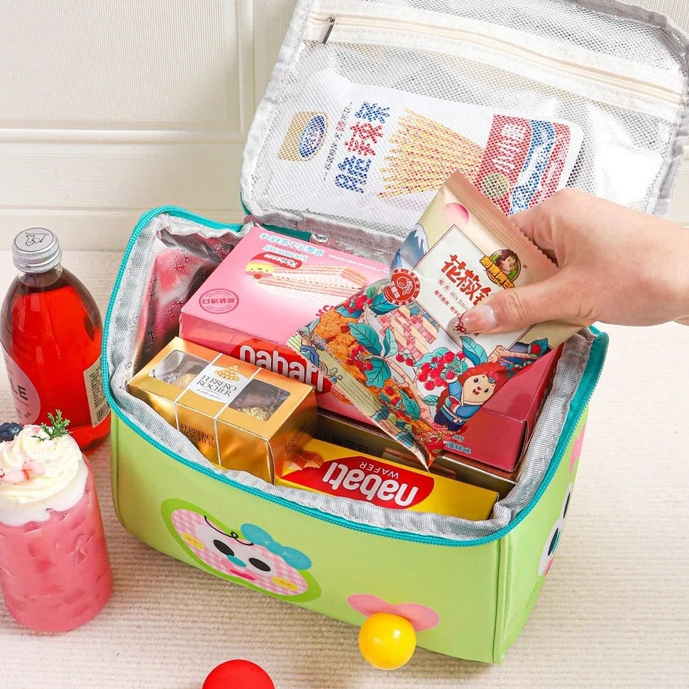 Colorful insulated kawaii lunch bag with snacks and drinks on a white surface