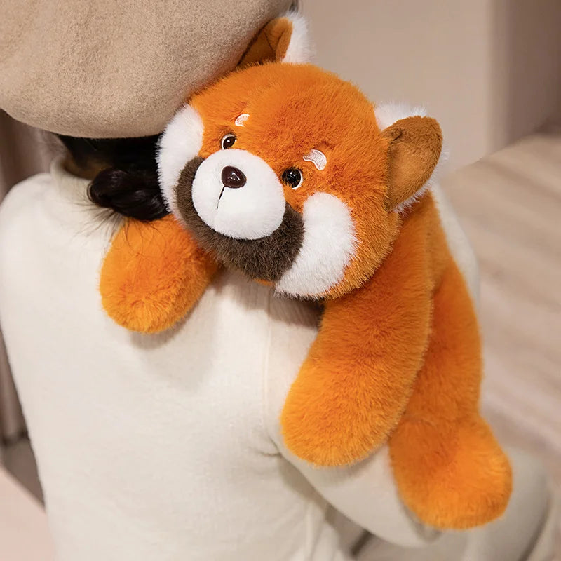 Kawaii plush toy fox held by a person with a neutral background