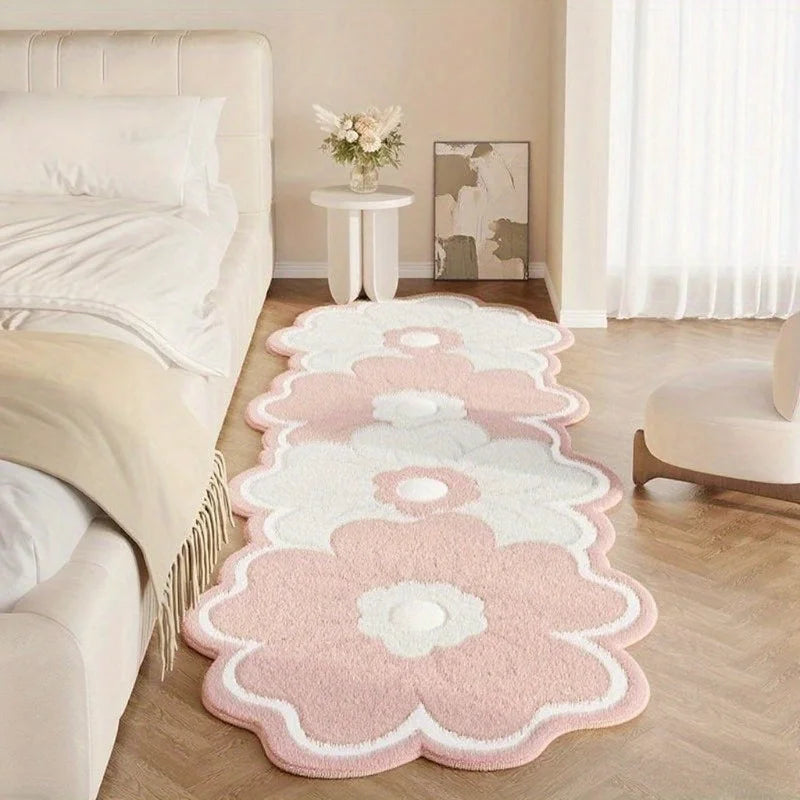 Pink floral kawaii rug on a wooden floor in a bedroom setting