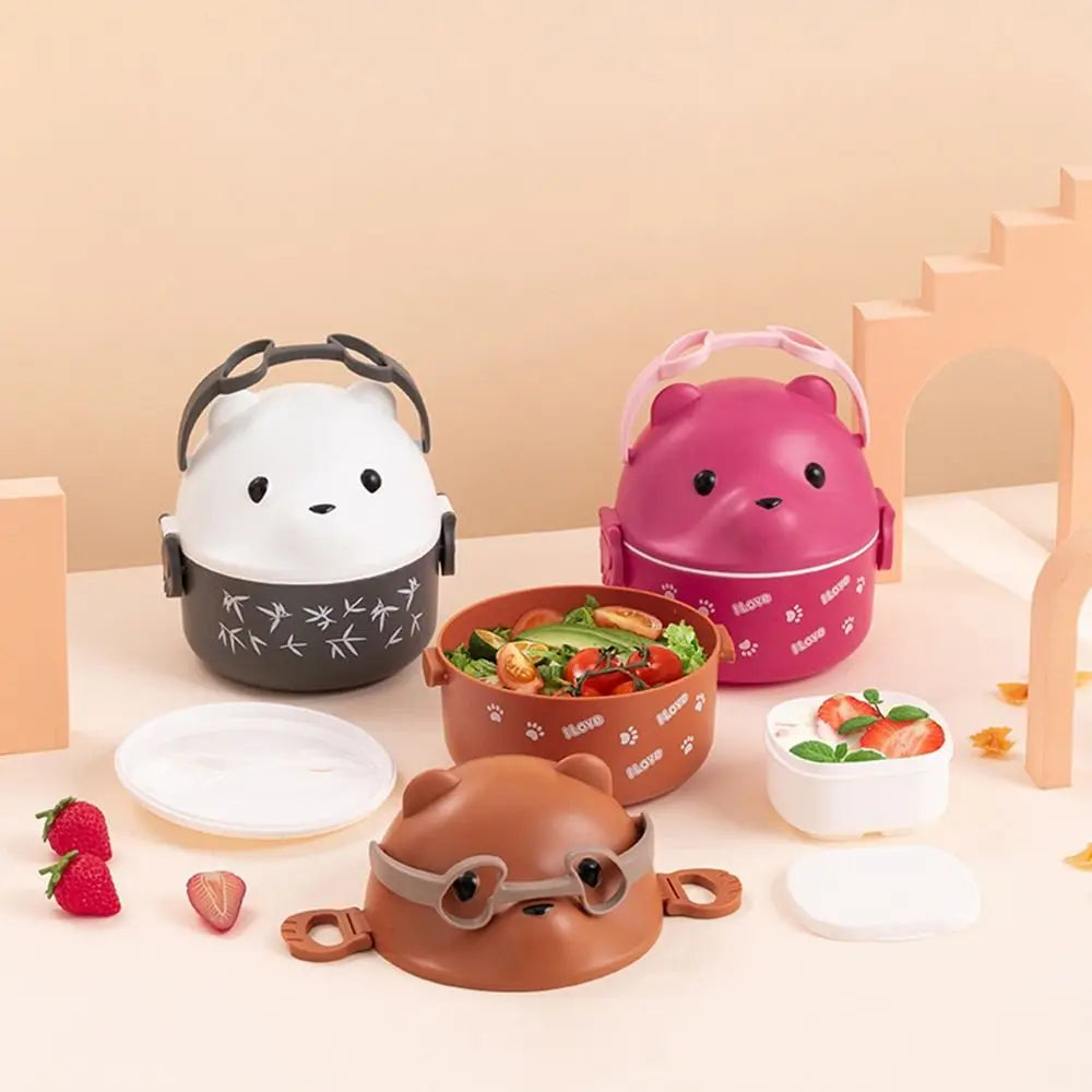 Set of cartoon-style kawaii lunch boxes on a light background