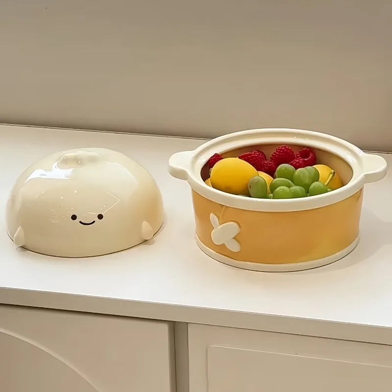 A yellow and white cute kawaii ramen bowl sitting on a table