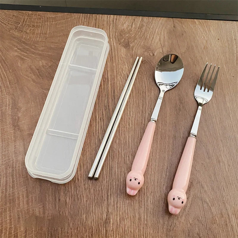 Pink, rabbit shaped kawaii utensils on the table