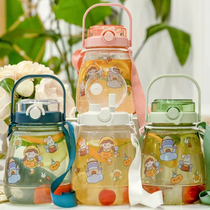 Three colorful kawaii water bottles with cartoon designs on a light background