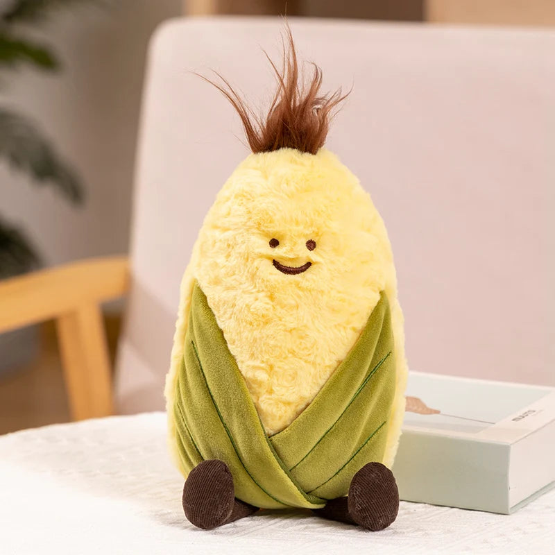 Plush toy shaped like a wrapped corn on a table with a blurred background