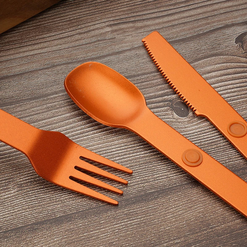 Close up of a set of orange kawaii utensils