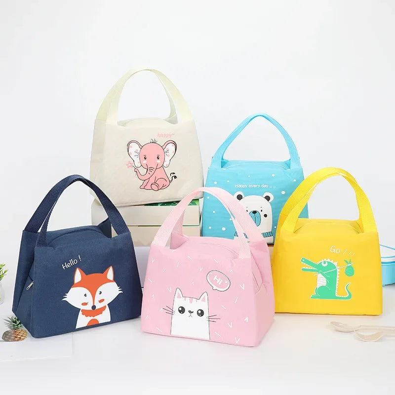 Set of colorful kawaii lunch bags with animal illustrations on a white background