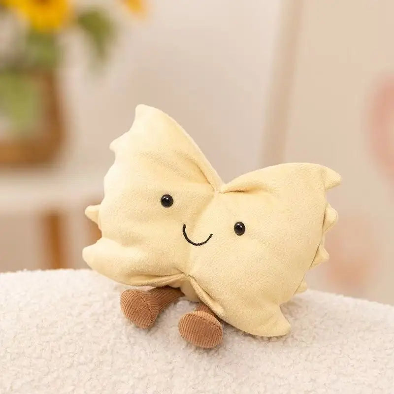 Kawaii plush toy shaped like a cloud with a smiling face on a soft surface.