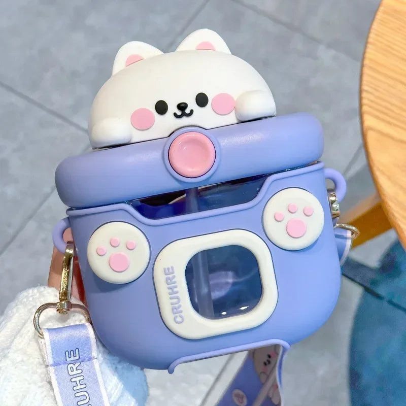 Cute purple and white character-shaped kawaii water bottle with a keychain, on a neutral background.