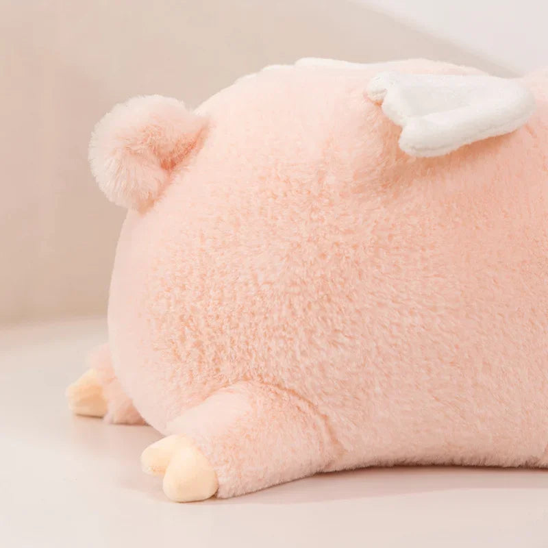 Kawaii plush toy resembling a pig on a light background