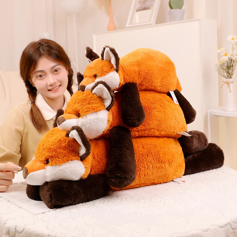 Woman holding a large kawaii plush fox toy on a bed