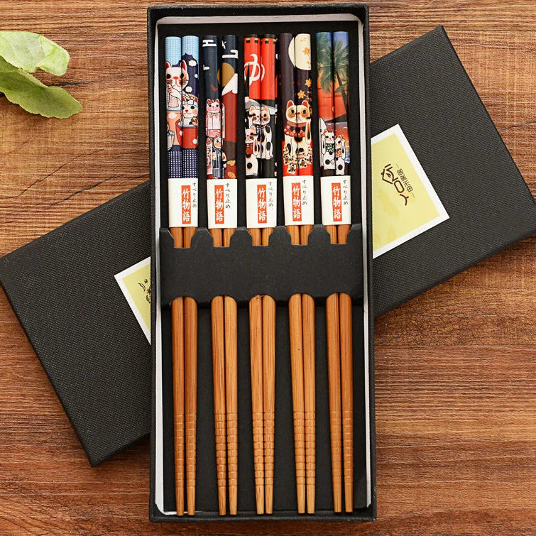 A set of kawaii chopsticks on a wooden table