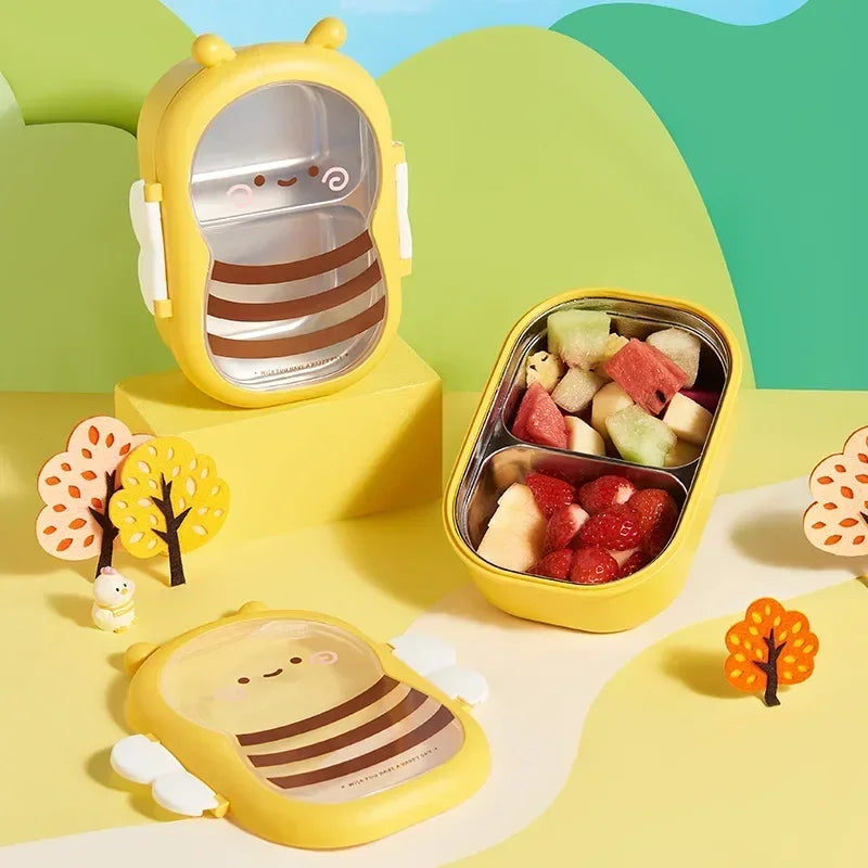 Yellow bee-themed kawaii bento box with compartments filled with fruits on a colorful landscape background