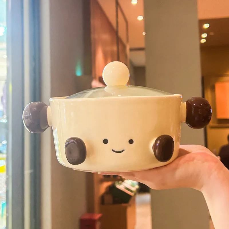A white and brown kawaii bowl with a smiley face on it