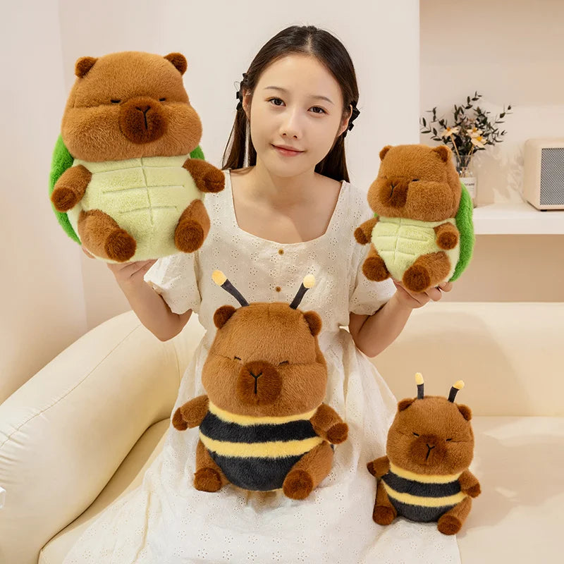 Woman holding four brown kawaii teddy bears with different outfits in a living room setting.