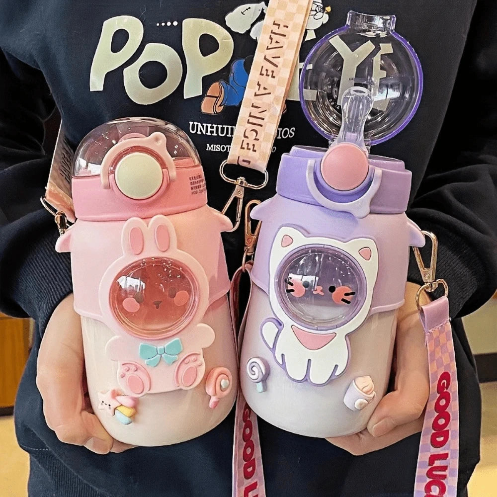 Two cartoon-themed kawaii water bottles held by a person with visible text in the background.