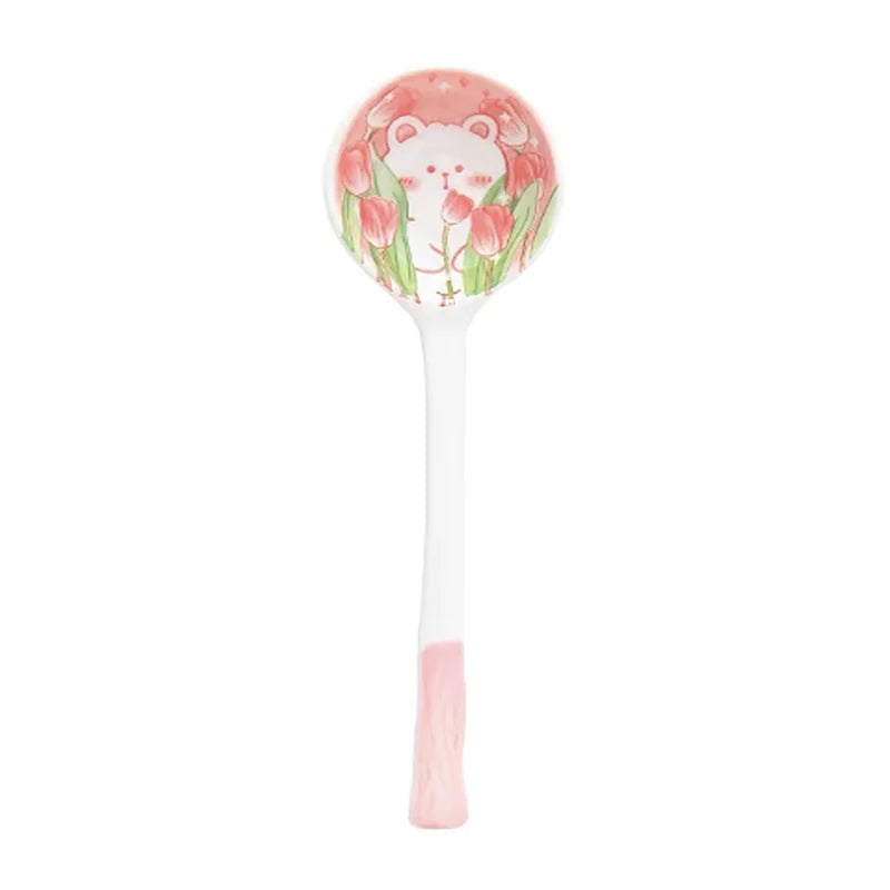 A white and pink kawaii spoon with a bear design on a white background