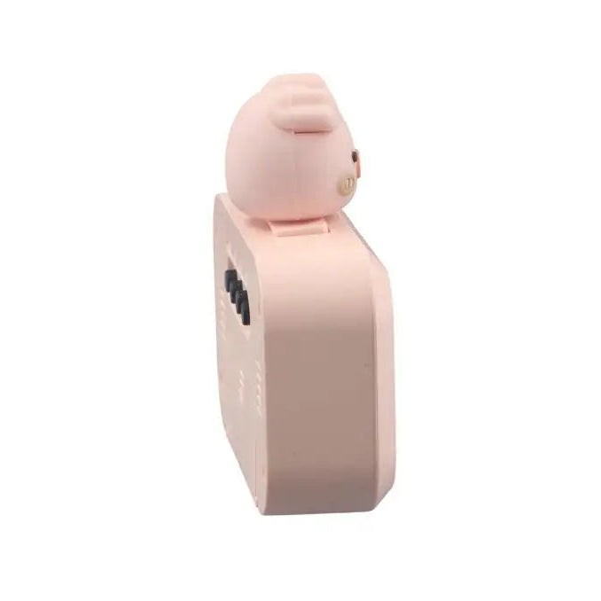 Pink kawaii alarm clock with a cartoon character on top on a white background