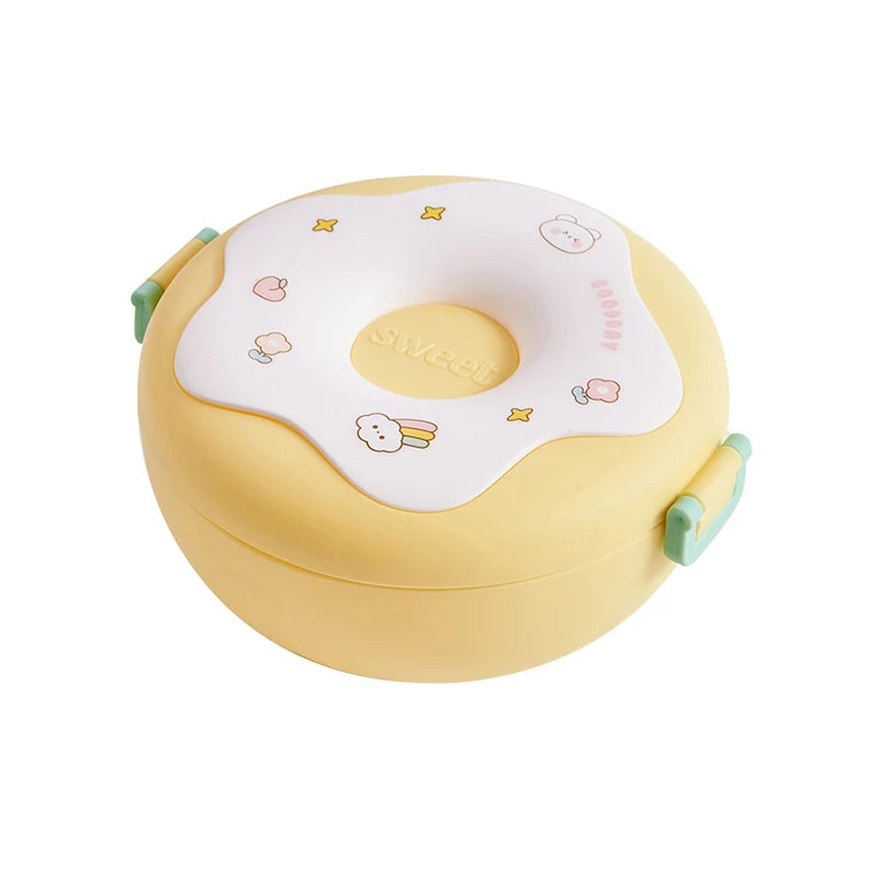 Yellow kawaii children's lunch box featuring cartoon characters on a white background