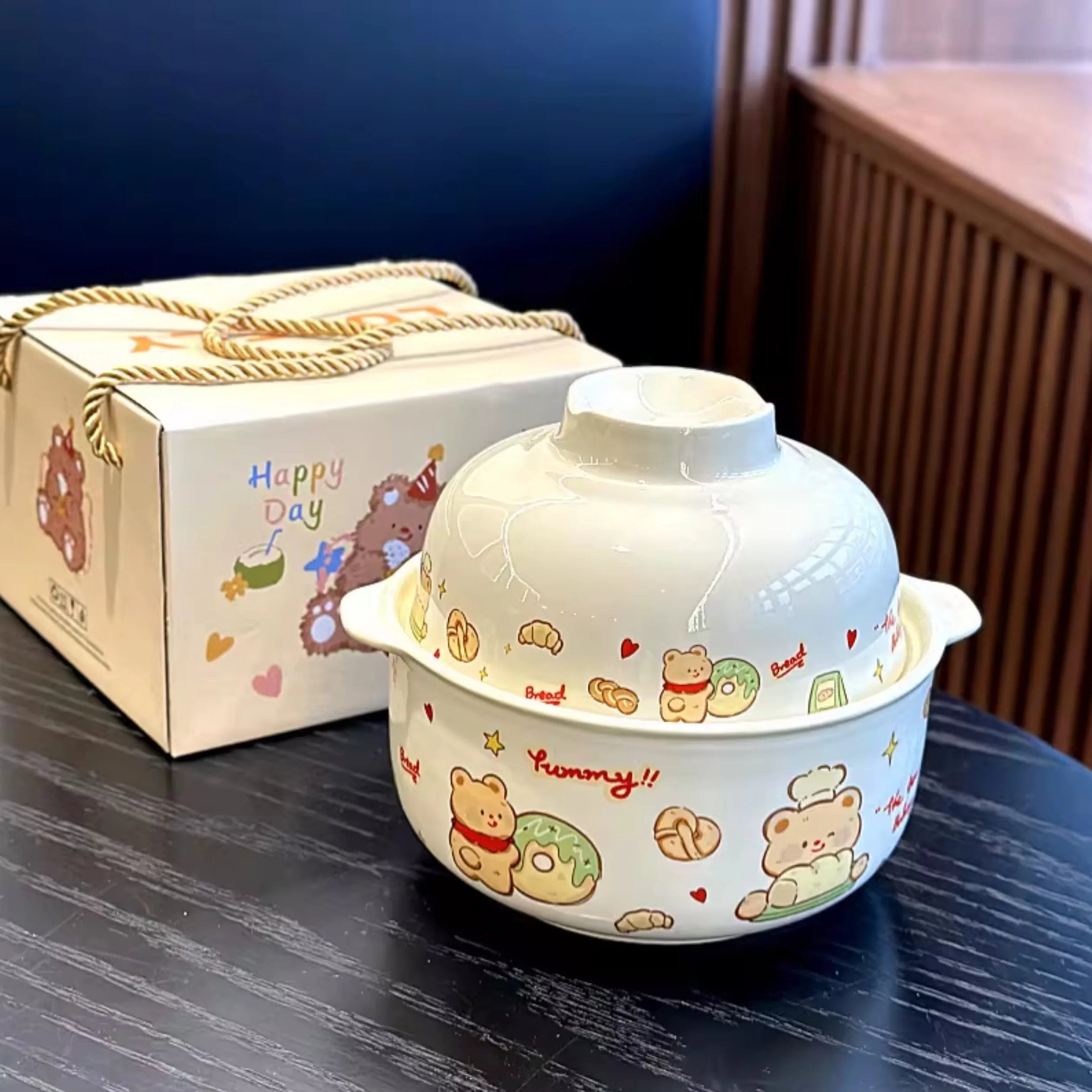A cartoon bear themed kawaii ramen bowl on a table