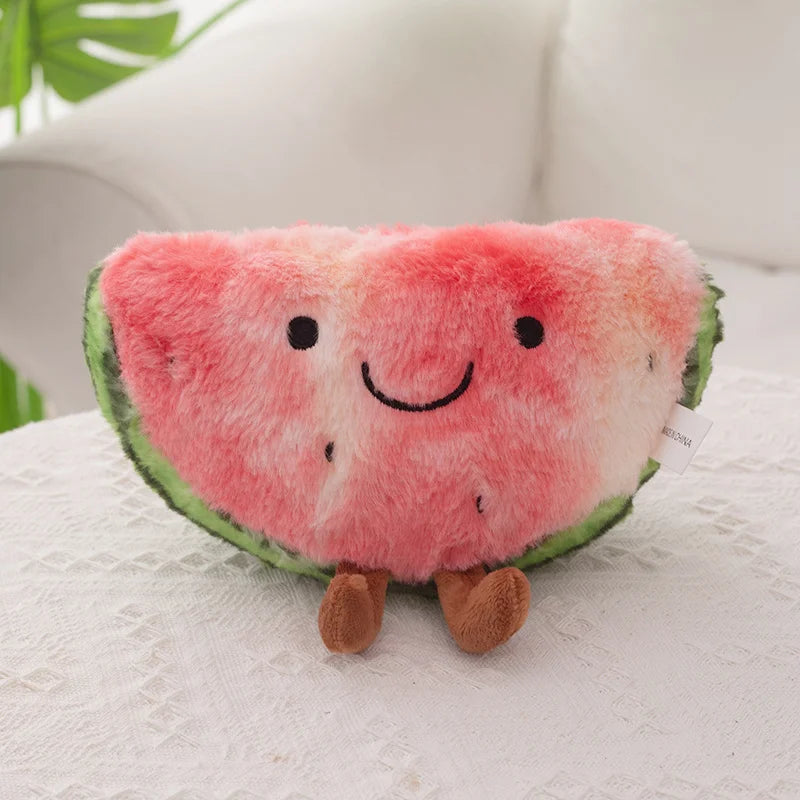 Kawaii plush toy shaped like a watermelon slice with a smiley face on a white surface.