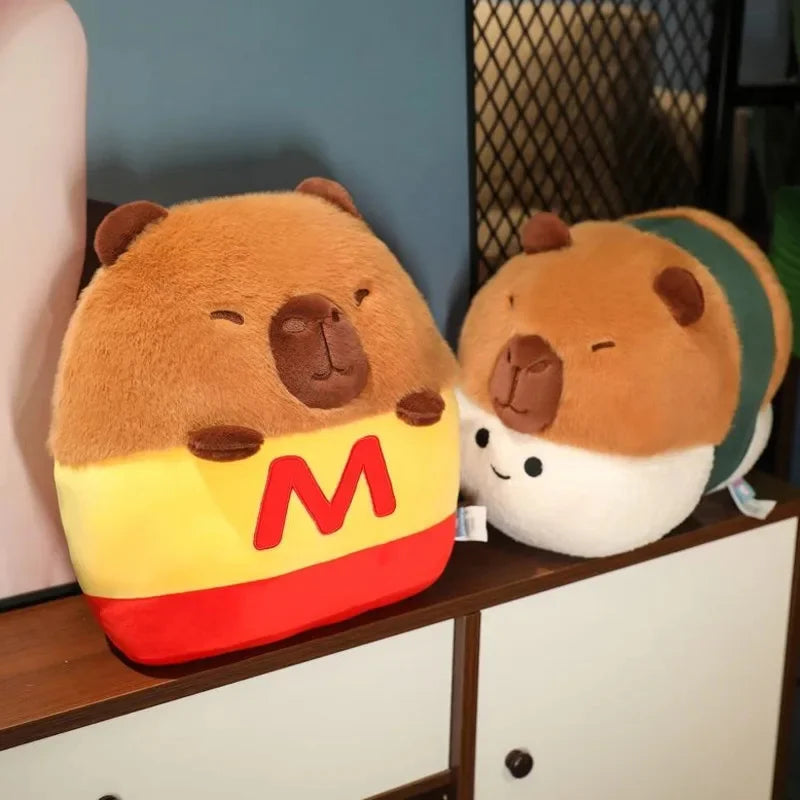 Two kawaii plush toys resembling bears with a 'M' logo on a shelf.