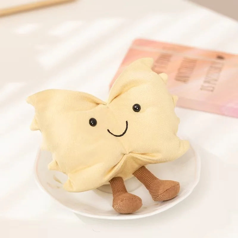 Cute kawaii plush toy resembling a cloud with a smiling face on a white plate.