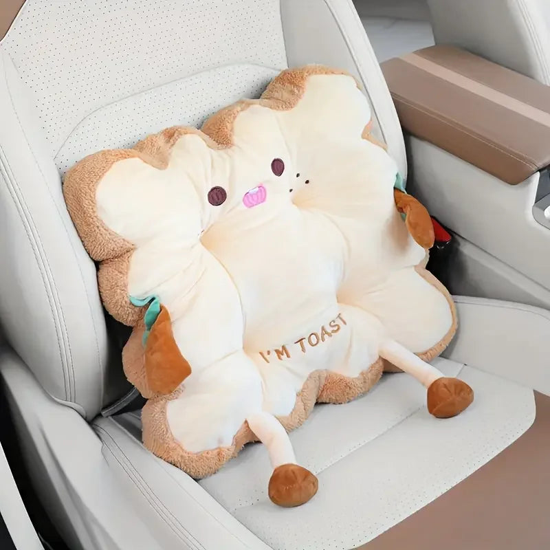 Kawaii plush toy resembling toast with a face on a car seat