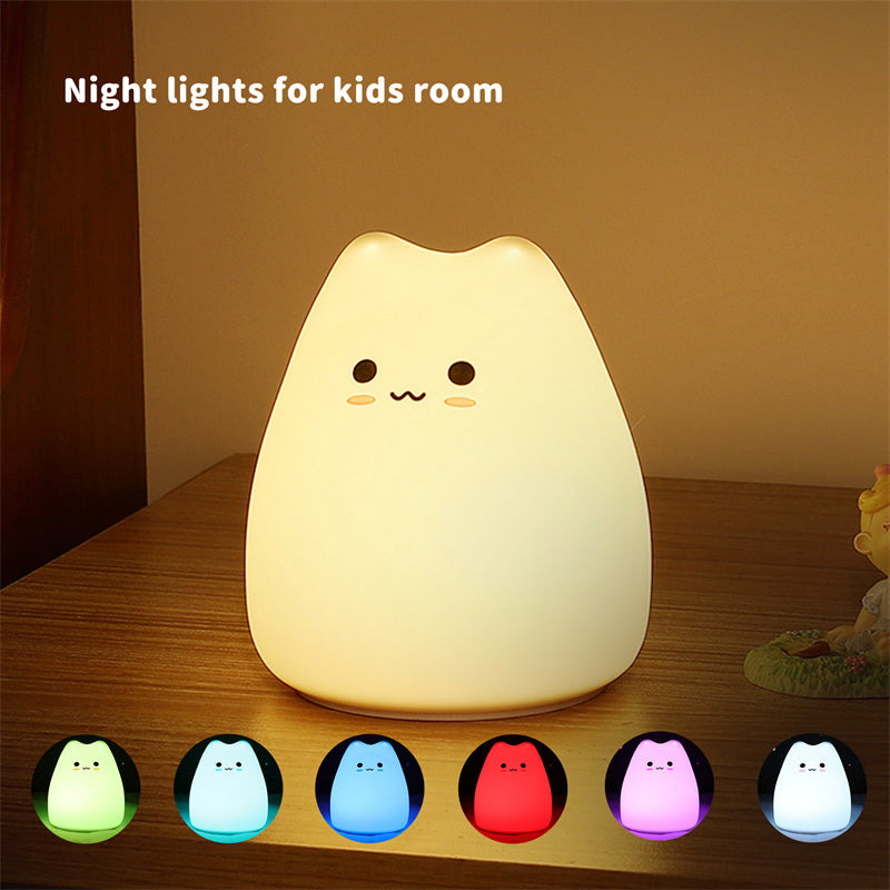 Kawaii cat-shaped night light on a wooden surface with color-changing options displayed below.