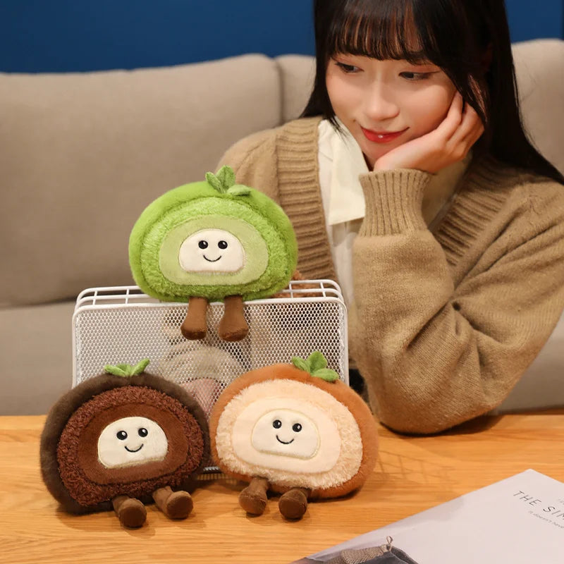 Person sitting with kawaii plush toys resembling fruits on a table