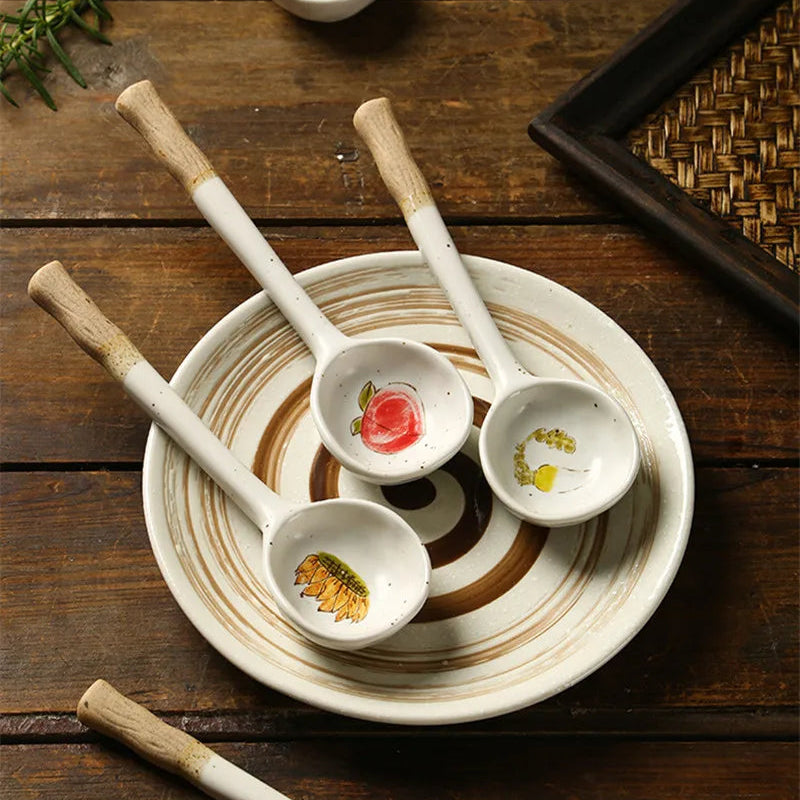 Three ceramic kawaii spoons inside a bowl