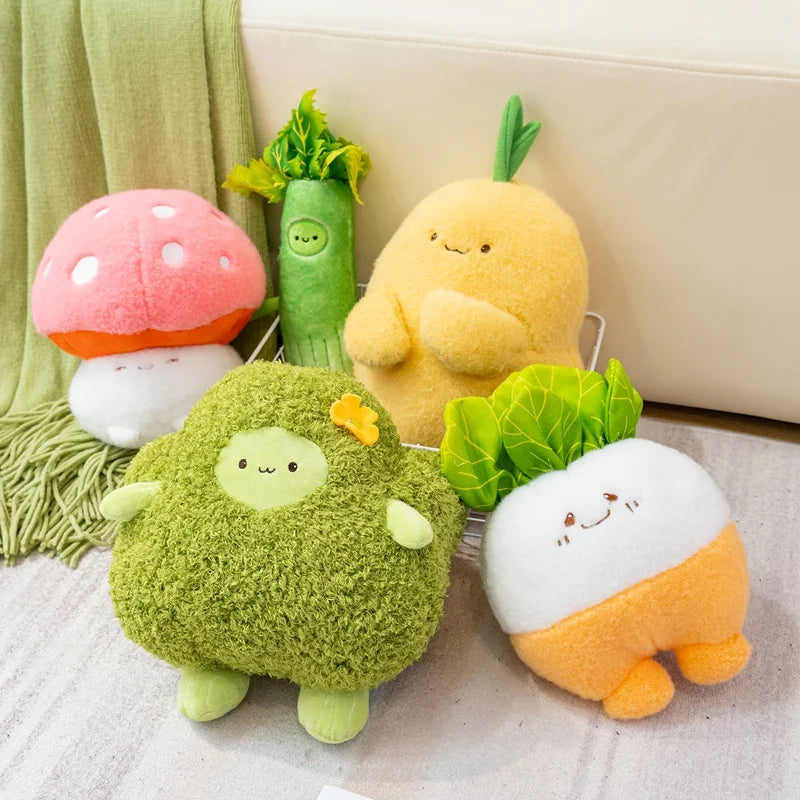 Set of kawaii plush toys shaped like vegetables on a light surface with a green blanket.