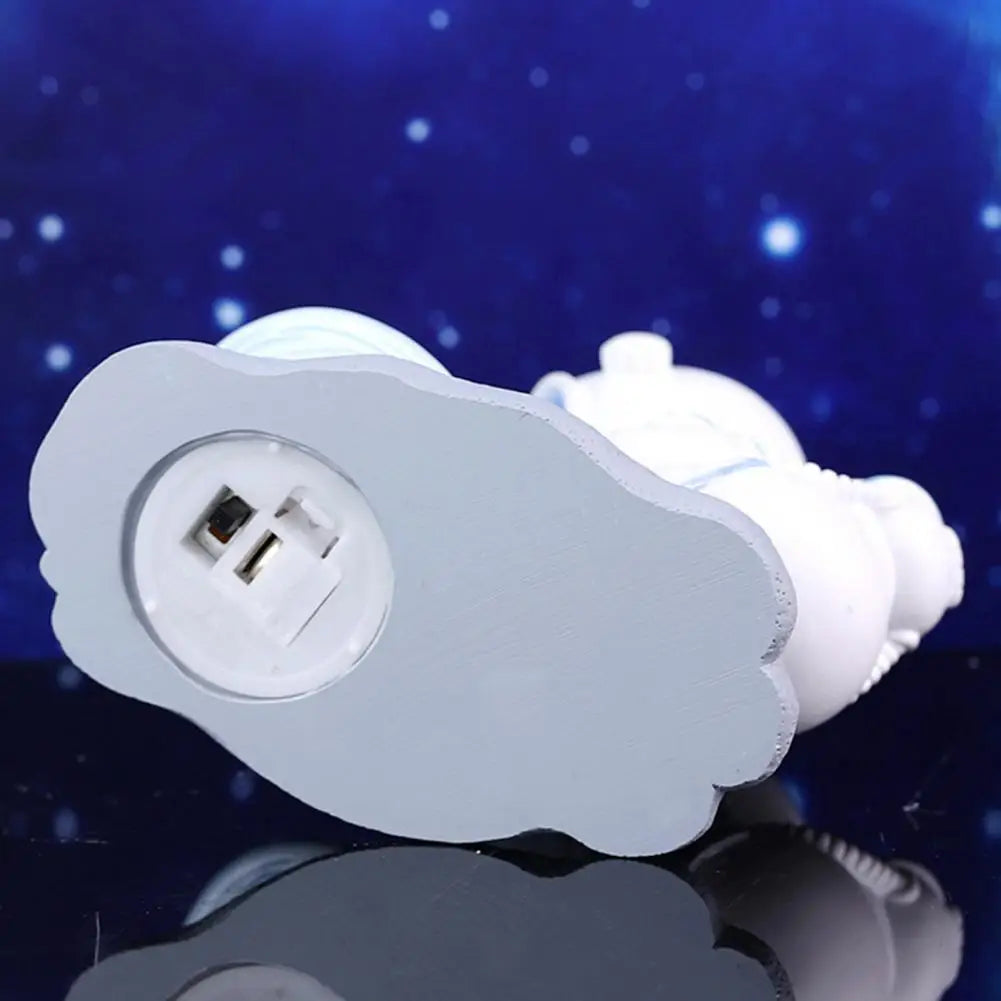 White kawaii-shaped object with a circular component on a reflective surface and blue gradient background