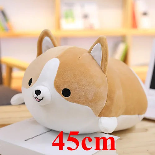 Corgi-shaped plush kawaii toy on a surface with a blurred background