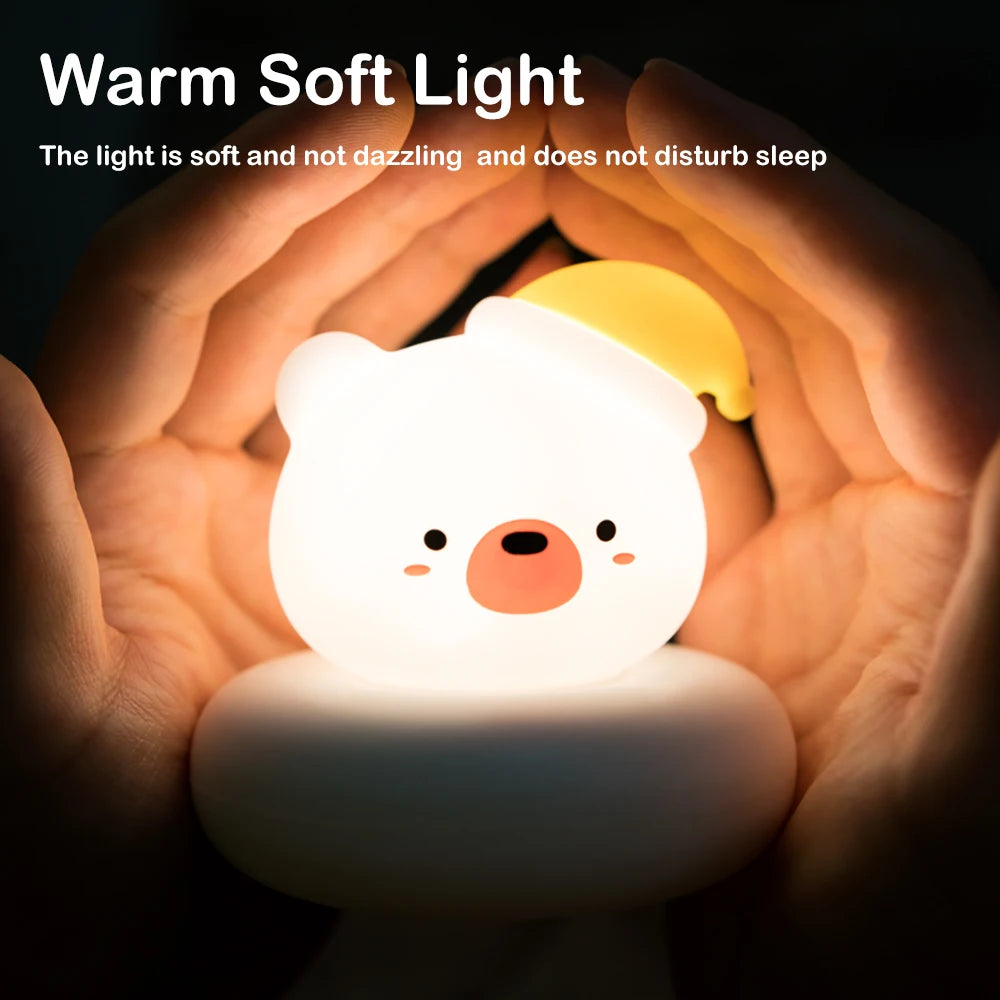 Cute kawaii animal-shaped night light held in hands with text about its soft light.