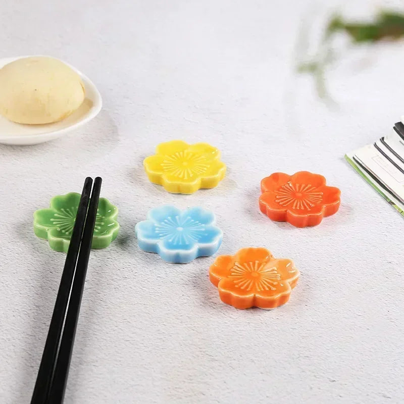 Five multicolored kawaii chopstick holders