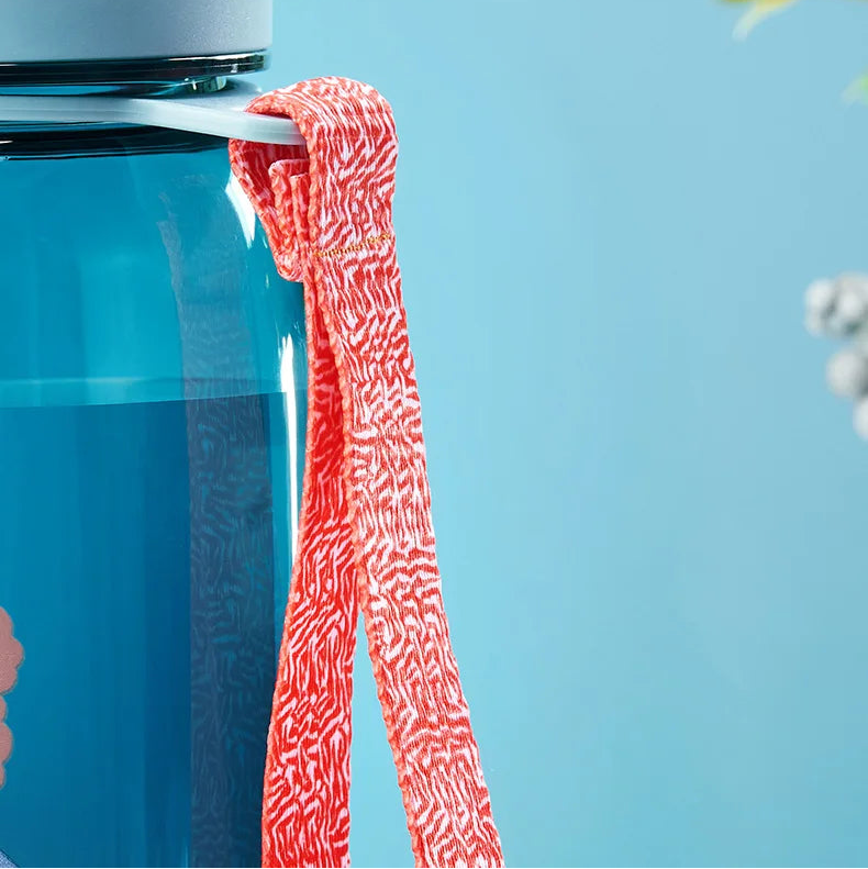 Close-up of a sealing ring of a kawaii water bottle on a blue container with a light blue background
