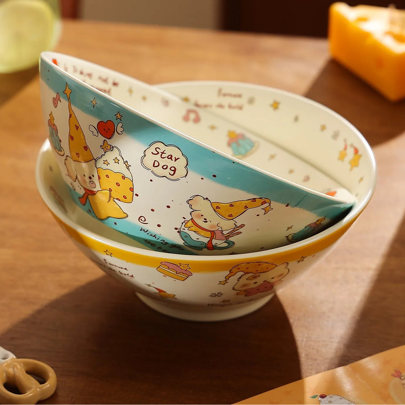 Stacked ceramic kawaii ramen bowls with cartoon design on a wooden surface, text about safe craftsmanship.