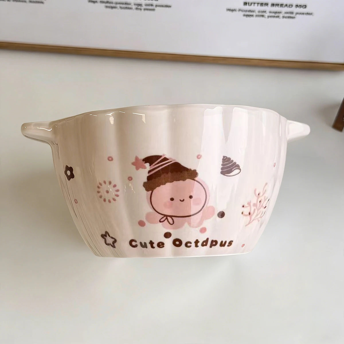 Ceramic kawaii ramen bowl with a cute octopus design on a white background