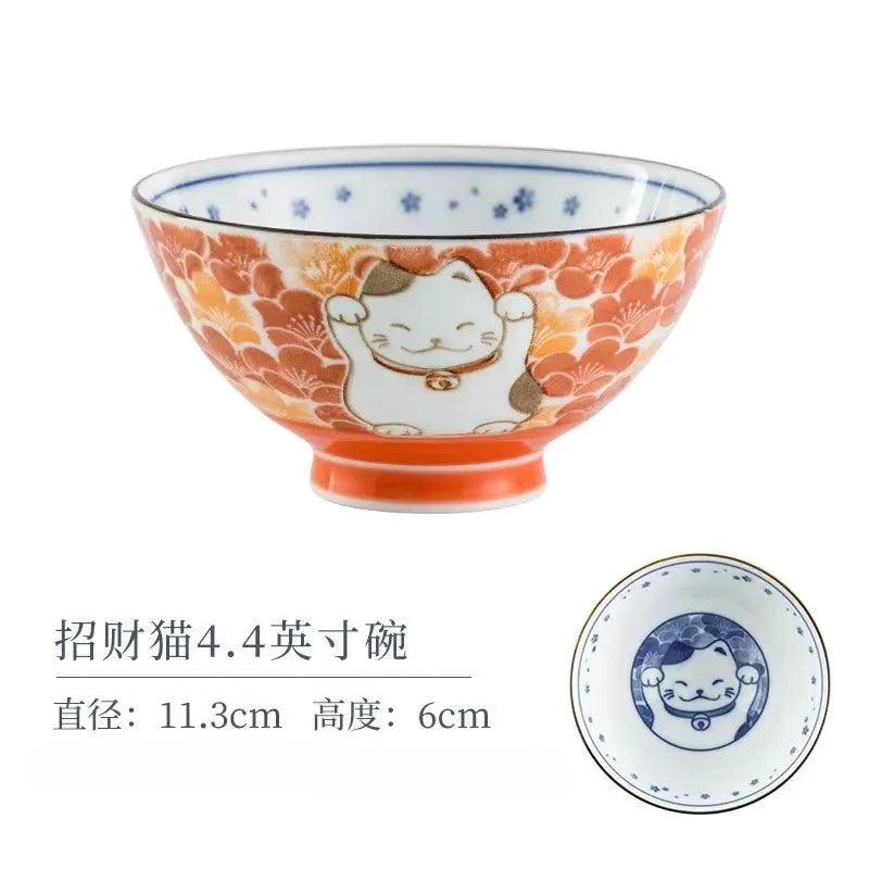 A kawaii bowl with a lucky cat design against a white background