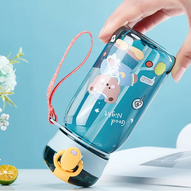 Children's kawaii water bottle with bear design and leak-proof seal on a light blue background