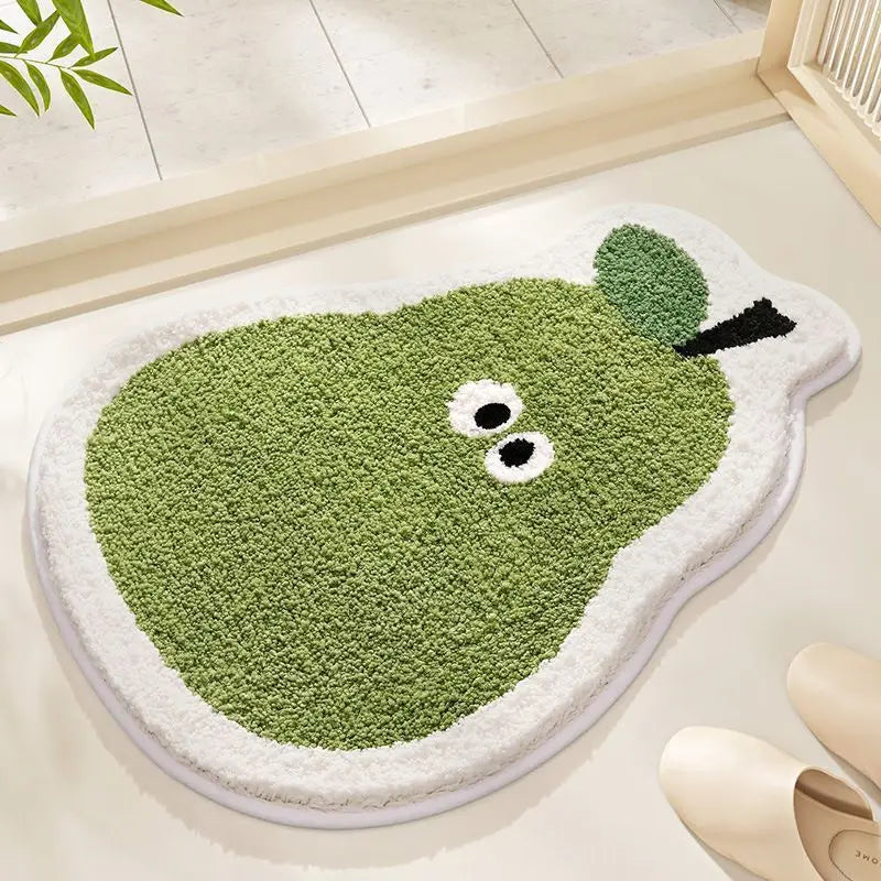 Green caterpillar-shaped kawaii rug on a light wooden floor