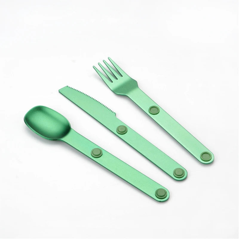 A set of green kawaii utensils on a white background