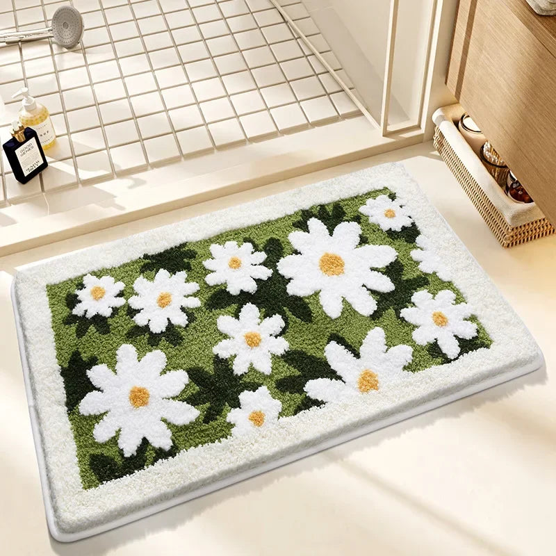 Decorative kawaii bath mat with white flowers on a green background in a bathroom setting.