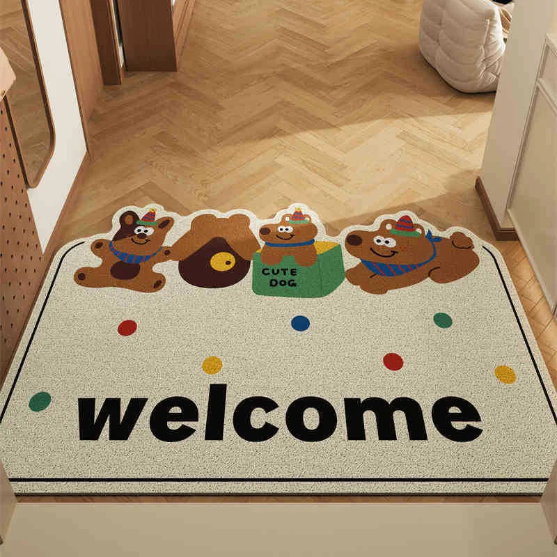 Doormat with cartoon Kawaii bears and the word 'welcome' on a wooden floor.