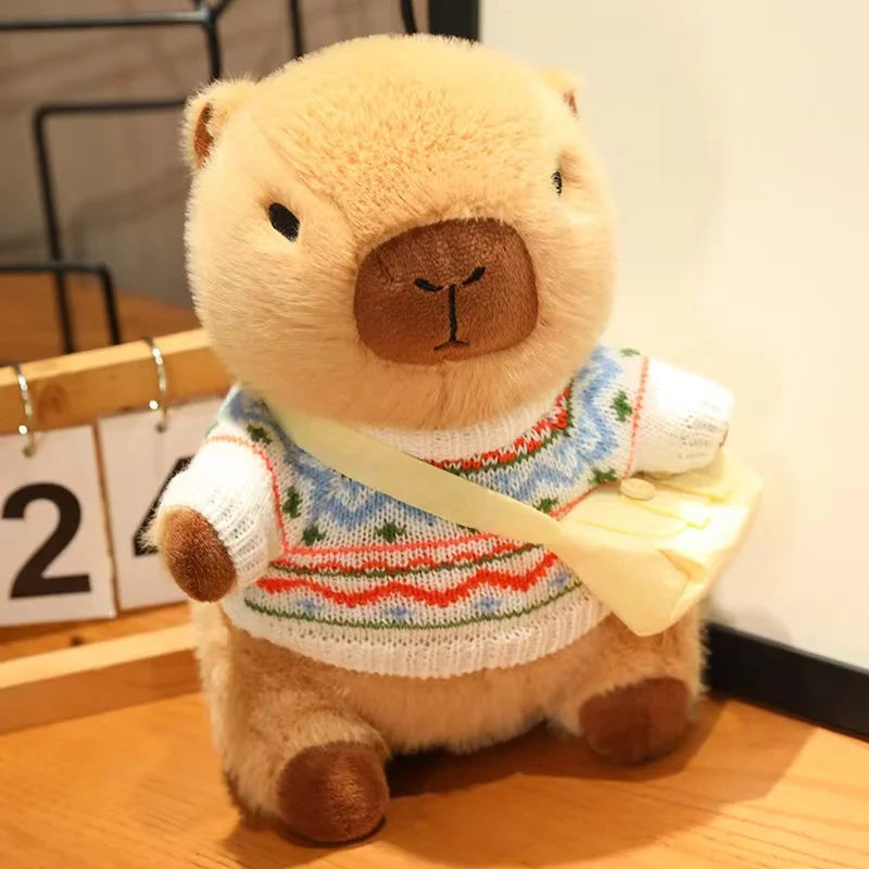 Kawaii plush bear toy wearing a colorful sweater on a wooden surface