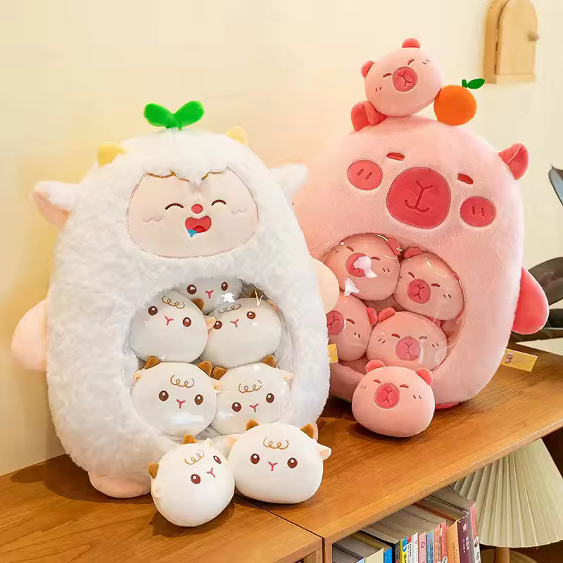 Set of cute kawaii plush toys including a white sheep and pink pigs on a wooden surface.