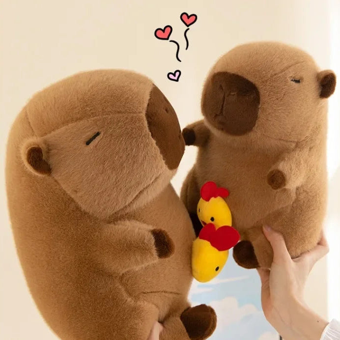 Two brown kawaii plush animals holding a yellow chick with hearts above on a beige background